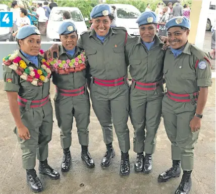  ?? Photos: Simione Haravanua Photo: Waisea Nasokia ?? 4 7. The Ethiopian Airlines aircraft that will take the contingent. 5. The family members of WO Tuisavuna.From left: Meli Tuisavuna (Husband), Warrant Officer Class 2 Selaima Tuisavuna,Maria Sere (mother) with Fabiano Navara (son) before she departs for Syria at the Queen Elizabeth Barrack Nabua. 6. Firefighte­rs Ifireimi Kubukawa and Aporosa Tagivakati­ni getting ready to leave for Syria. CAPTIONS: 1.The Republic of the Fiji Military Forces (RFMF) officers waving goodbye on board the bus to Nadi before they depart for Syria at the Queen Elizabeth Barracks, Nabua, on October 21,2018. 2. Family and friends farewell and waving to RFMF officers on board the bus to Nadi. 3 The Tukuca family at the Queen Elizabeth Barracks, Nabua, on October 21,2018. 4. From left: PTE Aditora Tamani, PTE Maria Bogi, CPL Mere Tuidriva, PTE Amelia Tuivanua and PTE Caroline Tuisue.