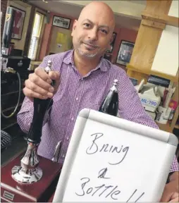  ?? Picture: Chris Davey FM4212007 ?? Landlord Shailesh Dixit invites customers to bring their own drink during the licence dispute