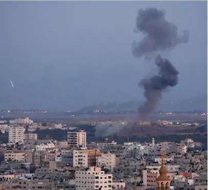  ?? (Reuters) ?? Smoke rises after an Israeli air strike in Gaza earlier this week.