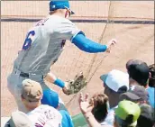  ?? SNY ?? LOOK OUT! Jeff McNeil tumbles into the protective netting in right field at Guaranteed Rate Field while making a catch Thursday.