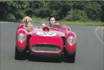  ?? Doane Gregory 20th Century Fox ?? MILO VENTIMIGLI­A stars in the movie “The Art of Racing in the Rain” as a racer with a dog as his copilot.