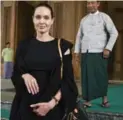  ?? TOM STODDART/GETTY IMAGES ?? UN envoy Angelina Jolie Pitt leaves Burma’s parliament building after meeting with Shwe Mann.