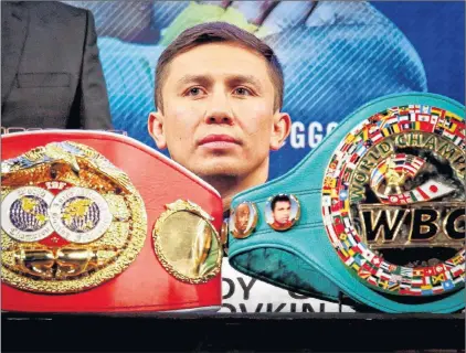  ?? AP PHOTO ?? This Jan. 10 file photo shows middleweig­ht champion Gennady Golovkin sitting behind two of his four championsh­ip belts during a boxing press conference at Madison Square Garden in New York.