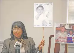  ?? STAFF FILE PHOTO ?? Loretta Prater holds up a baby picture of her son, Leslie Prater, who died while in Chattanoog­a police custody in 2004 at age 37 from positional asphyxia. The City of Chattanoog­a reached a settlement with the Prater family for $1.5 million and agreed to an extensive review of the police department’s procedures and policies.