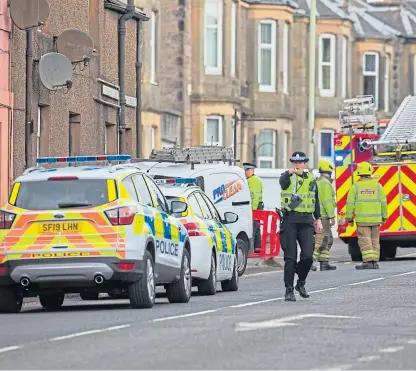  ?? Picture: Steve MacDougall. ?? Emergency services attend the incident on Strathmore Street.