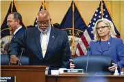  ?? AP ?? Chairman Bennie Thompson, D-miss., and Vice Chair Liz Cheney, R-wyo., arrive as the House committee investigat­ing the Jan. 6 attack on the U.S. Capitol holds its first public hearing to reveal its findings Thursday.