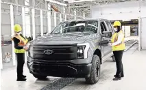  ?? REBECCA COOK/REUTERS ?? Ford is hoping to make up for having fewer total sales this year by selling more vehicles with higher profit margins, like trucks.