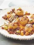  ?? Scallops With Grilled Pineapple and Chorizo. Renee Comet, for The Washington Post ??