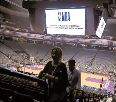  ?? AP FILE ?? Fans leave the Kings’ arena on March 11, 2020, after a game against the Pelicans was postponed at the last minute due to the coronaviru­s.