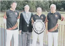  ??  ?? Ian Riches, Sunderland &amp; District President John Patterson, Neal Ridley and Billy Ferry with the Burkett Shield.