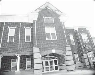  ?? Photos by Ernest A. Brown ?? Above: The new Woonsocket Middle School opened in 2010. It was a key achievemen­t for the administra­tion of former Mayor Susan D. Menard, who served as mayor from 1995 to 2009. The twinschool complex will be officially named for Menard in a ceremony on...