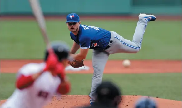  ?? AP PHOTO ?? Toronto Blue Jays starting pitcher Thomas Pannone pitches during the first inning of a game against the Boston Red Sox at Fenway Park in Boston on Thursday.