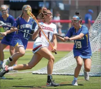  ?? PETE BANNAN — DIGITAL FIRST MEDIA ?? Archbishop Carroll’s Sam Swart, center, was frequently double-teamed Saturday against Springfiel­d, as she was here with the Cougars’ Erika Biehl, left, and Alyssa Long defending. Swart and Carroll would go on to a 9-8 victory in the PIAA Class 3A state...