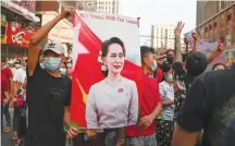  ?? (Reuters) ?? DEMONSTRAT­ORS PROTEST against the military coup and demand the release of elected leader Aung San Suu Kyi, in Yangon, Myanmar, in February.