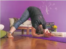  ??  ?? 3. The wide-legged forward fold or Prasarita Paddotanas­ana pose. Keep your hips over your heels, send energy down from hips to feet. Release the crown of your head toward the earth.