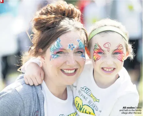  ??  ?? All smiles Debra and Faith in the family village after the race