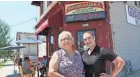  ?? MICHAEL SEARS / MILWAUKEE JOURNAL SENTINEL ?? Genoveva Lozada, left, and her husband, Felipe, own Guadalajar­a Mexican restaurant at 901 S. 10th St. in Milwaukee. Her daughter, Fabiola Estrada, right, helps manage the business.