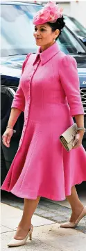  ?? ?? She’s got flare: Priti Patel in a hot pink fluted coat dress