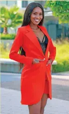  ??  ?? FIERY RED: Not only that but it’s versatilit­y is top notch, it can be donned as a dress or a suit blazer