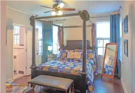  ??  ?? ABOVE: A four poster bed anchors the master bedroom.