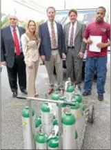  ?? Times staff / ERIC HARTLINE ?? Main Line Medical employees Louis Cristinzia­ni, Gaile LaBar, owner Ben Bernhardt, Terry Mele and Mike Campbell.