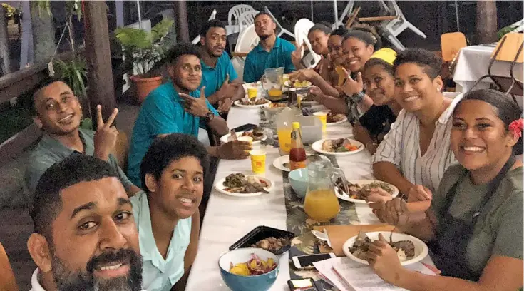  ?? ?? Owners of Kanalevu Kitchen in Suva are in for a surprise when New Zealand based chef, Josua Rasolo, visits good friends Frank (left) and Vui Saketa (second from right), on his next trip to Fiji.