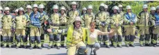  ??  ?? Erstmals traten nach Übungsende alle beteiligte­n Feuerwehrl­eute aus den vier Abteilunge­n der Gesamtwehr Wilhelmsdo­rf gemeinsam an.