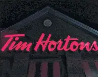  ?? CP PHOTO ?? A Tim Hortons restaurant sign is shown in Newcastle, Ont., on Feb. 11.