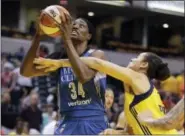  ?? AP PHOTO — DARRON CUMMINGS ?? Minnesota Lynx’s Sylvia Fowles is fouled by Indiana Fever’s Natalie Achonwa as she goes up for a shot during the first half of a WNBA basketball game on Aug. 30, 2017 in Indianapol­is.