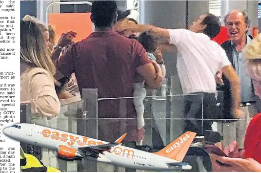  ?? Pictures: ARABELLA ARKWRIGHT, BBC ?? A worker is allegedly seen punching a British man holding a baby in a photo taken by a shocked fellow passenger on Saturday