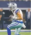  ?? ASSOCIATED PRESS FILE PHOTOS ?? Cowboys quarterbac­k Dak Prescott, left, will be looking for new targets to throw to Sunday, including Cole Beasley, above.