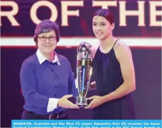  ?? — AFP ?? BANGKOK: Australia and Sky Blue FC player Samantha Kerr (R) receives the Asian Football Confederat­ion Women’s Player of the Year award at the AFC Annual Awards in Bangkok yesterday.