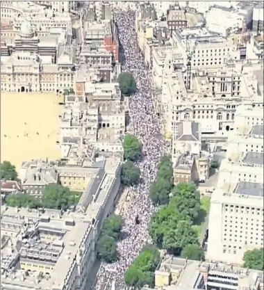  ?? Picture: ITV ?? Organisers claim 100,000 people took part in the march through London