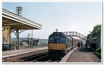  ?? COLOUR RAIL. ?? An unidentifi­ed Type 2 arrives at Ellon on June 6 1963. The station would close to passengers just over two years later, with the line eventually shut to freight in 1979.