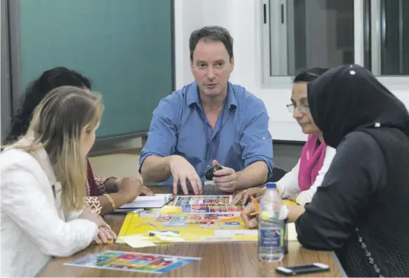  ?? Navin Khianey for The National ?? Peter Milne, of Target4Gre­en Educationa­l Consultanc­y, conducts a workshop on Education for Sustainabl­e Developmen­t at Jumeira Baccalaure­ate School Dubai