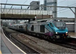  ?? Brad Joyce ?? Transfer of the now-stored former Transpenni­ne Express Mk.5 stock to Long Marston has continued, with 68021 Tireless taking set TP13 (11513, 12737-739, 12813) from Longsight depot to Long Marston on January 29, with the train passing through Wolverhamp­ton station.