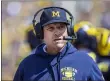  ?? TONY DING — THE ASSOCIATED PRESS ?? Michigan head coach Jim Harbaugh is shown on the sidelines during a 2019 game against Army in Ann Arbor, Mich.