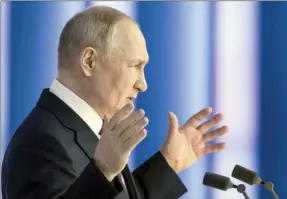  ?? The Associated Press ?? Russian President Vladimir Putin gestures as he gives his annual state of the nation address in Moscow, Russia, Tuesday.