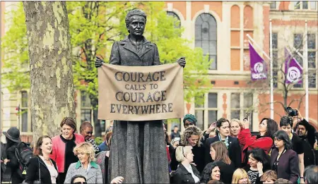  ?? Picture: GETTY IMAGES/DAN KITWOOD ?? WOMEN’S RIGHTS: A statue in honour of the first female suffragist Millicent Fawcett is unveiled during a ceremony in Parliament Square in London, England, last week