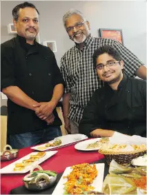  ?? PHOTOS: JEAN LEVAC ?? Flavours of Kerala restaurant chef Sarath Mohan, right, with owner Anil Nair and sous-chef Benny Vadakkan, left.