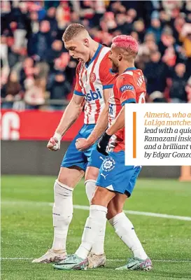  ?? ?? Girona’s Artem Dovbyk (L) celebrates with Yan Couto after scoring against Sevilla on Sunday