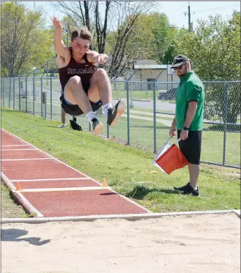  ?? Graham Thomas/Siloam Sunday ?? Siloam Springs’ Michael Rauch competes in the long jump in the 5A-West Conference Meet held Tuesday at Glenn W. Black Stadium in Siloam Springs.