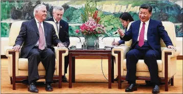  ?? GETTY IMAGES ?? U.S. Secretary of State Rex Tillerson (left) meets with Chinese President Xi Jinping at the Great Hall of the People on Saturday in Beijing. The U.S. wants China to pressure North Korea to quell its nuclear ambitions.