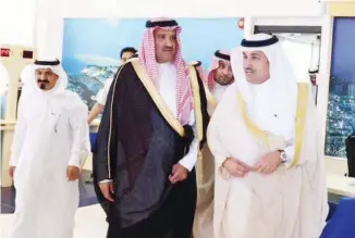  ??  ?? REGIONAL PRESENCE: Madinah Gov. Prince Faisal bin Salman tours the new building of the Saudi Arabian Airlines in Madinah in the presence of Saudia Director General Saleh Al-Jasser and other officials. (AN photo)