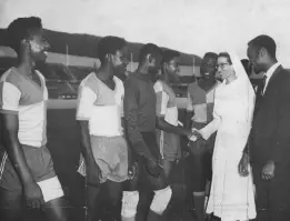  ?? GLEANER PHOTOGRAPH ?? Captain of Alpha Boys’ School football team is seen introducin­g Sister Ignacius to members of Alpha’s team at the National Stadium on Thursday, November 7, 1968 in the Private Secondary School competitio­n. Alpha won the match 6-2.