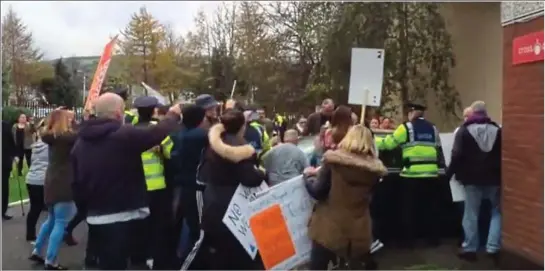  ??  ?? Angry reaction: Joan Burton described the activists as ‘wild’ and said there was ‘a great deal of noise and shouting’