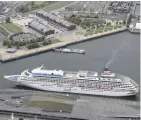  ?? The Yomiuri Shimbun ?? This aerial photo shows the Asuka II cruise ship at the Osanbashi Yokohama Internatio­nal Passenger Terminal in Yokohama on Saturday.