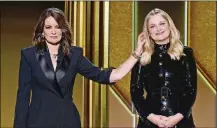  ?? NBC VIA AP ?? In this video grab issued Sunday, Feb. 28, 2021, by NBC, hosts Tina Fey, left, from New York, and Amy Poehler, from Beverly Hills, Calif., speak at the Golden Globe Awards.