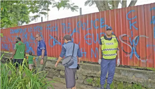  ?? Photos: Ronald Kumar ?? Police and civil servants came across these writings spray painted on walls at Nanuku and Veidogo informal settlement in Vatuwaqa during their clean up on May 13, 2020.