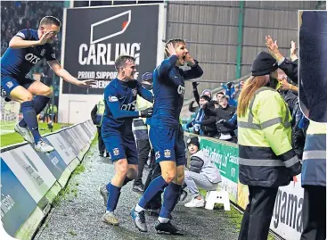  ??  ?? Killie’s Daro del Fabro celebrates his dramatic late equaliser with the away fans